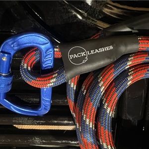 DOG leash, brand is “PACK” red, white, and blue leash never used!